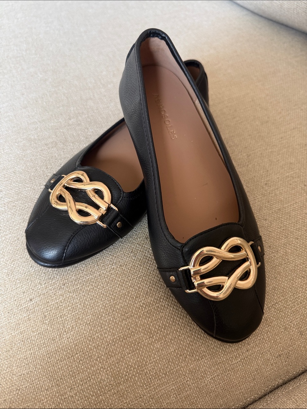 Franco Sarto Black Leather Flats with Gold Knot Accent